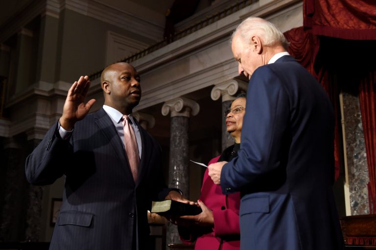 Vice President Joe Biden administers the ceremonial Senate oath to Sen. Tim Scott, R-S.C., during a ceremony in the Old Senate Chamber, Tuesday, Dec. 2, 2014. (AP Photo)