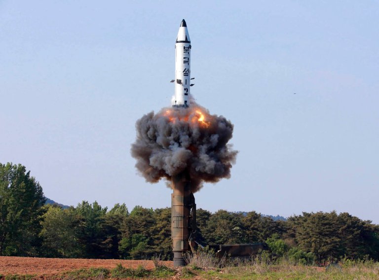 In this undated photo distributed by the North Korean government Monday, May 22, 2017, a solid-fuel 