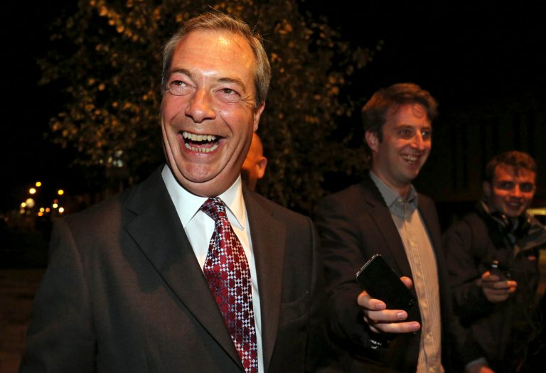 UKIP Party Leader Nigel Farage arrives for the vote count of a special election in the east England constituency of Clacton-on-Sea, England Friday Oct. 10, 2014. The U.K. Independence Party candidate Douglas Carswell won a seat in the British Parliament for the first time, a significant breakthrough for UKIP.  (AP Photo/PA, Chris Radburn) UNITED KINGDOM OUT, NO SALES, NO ARCHIVE