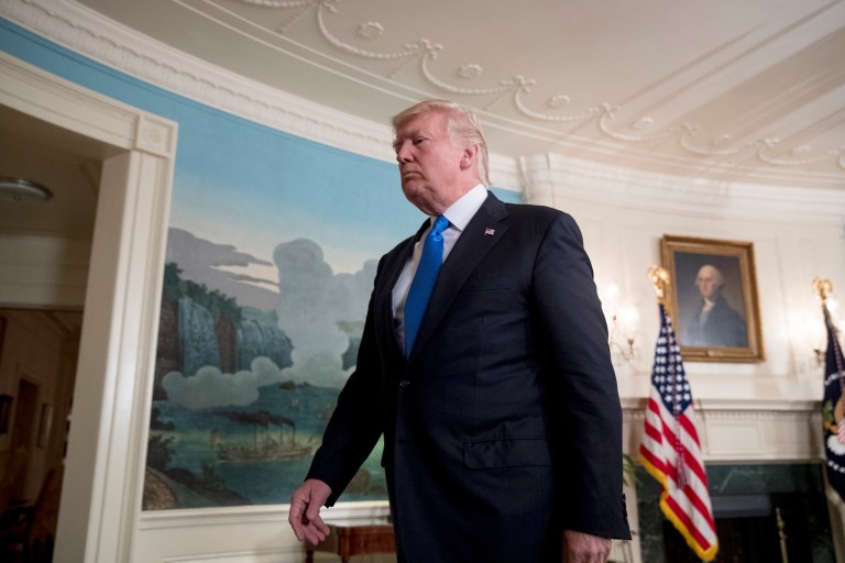 Acting solicitor general also told the justices that the case should not be considered moot because the ban never took effect in the first place. (AP Photo/Andrew Harnik)