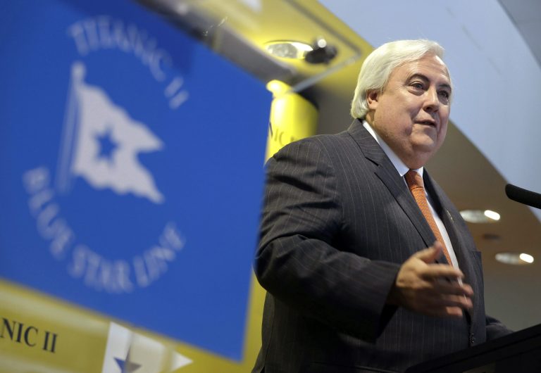 In this Feb. 26, 2013 file photo, Australian billionaire Clive Palmer speaks during a news conference in New York, about his intention to build the Titanic II. Palmer is a larger-than-life Australian multimillionaire whose headline-grabbing projects include building a replica of the Titanic and a Jurassic Park-style collection of 160 mechanized dinosaurs. (AP Photo/Seth Wenig, File)