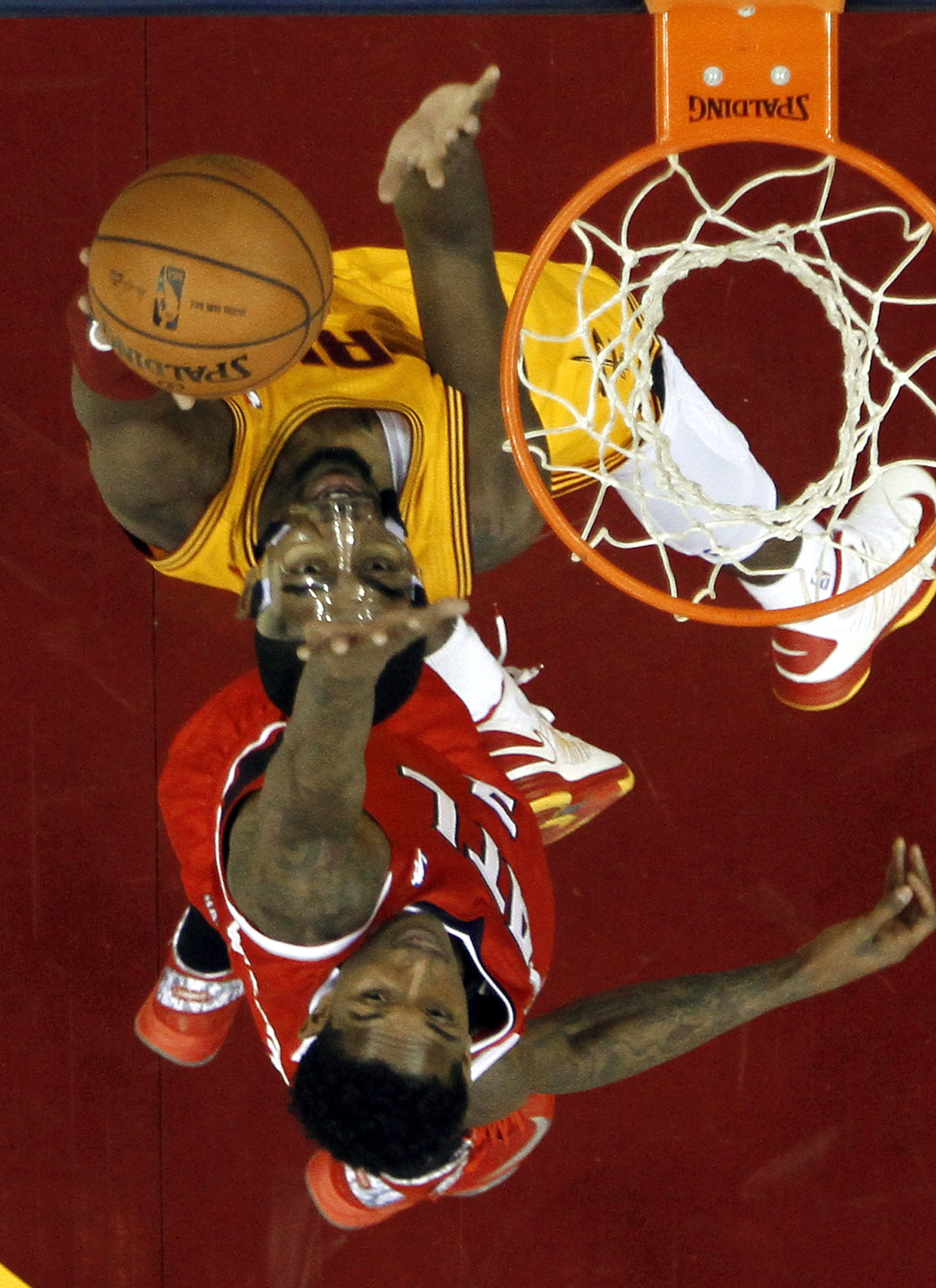 Teague leads Hawks past Cavaliers, 102-94