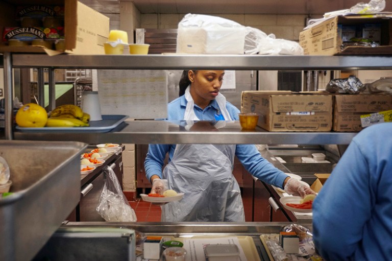 Employee Shantel Burris prepares patient meals at Montefiore Medical Center's Wakefield Campus in the Bronx borough of New York. (Michael Nagle/Bloomberg)
