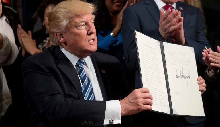 Trump has gladly signed into law the CRA resolutions of disapproval once they reached his desk, using them to tout his promise of reining in Washington's out-of-control bureaucracy. (AP Photo/Andrew Harnik)