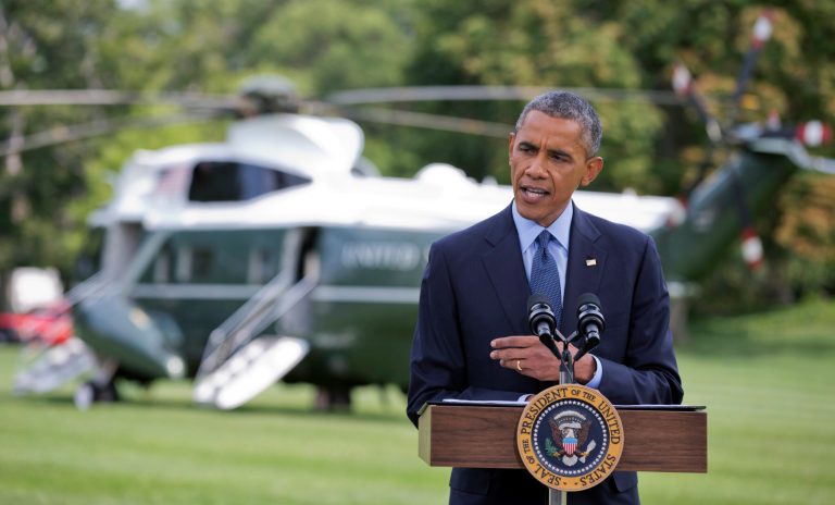President Barack Obama speaks on the South Lawn of the White House in Washington, Tuesday, July 29, 2014, as he announces new economic sanctions against key sectors of the Russian economy in the latest move to force Russian President Vladimir Putin to end his support for Ukrainian rebels.   (AP Photo/Manuel Balce Ceneta)