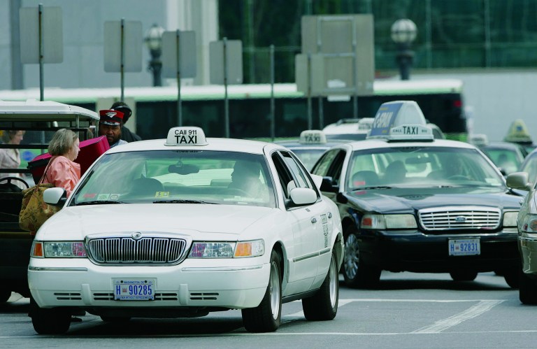 Published: No Published Caption
Original: Greg Whitesell/Examiner

Taxi Cab drivers line up in front of Union Station as passengers board for the destinations on Tuesday, June 6, 2006 in Washington, DC.  The DC Taxicab Commission which is currently using a zone-based method of pricing, is considering whether or not to use a meter system.