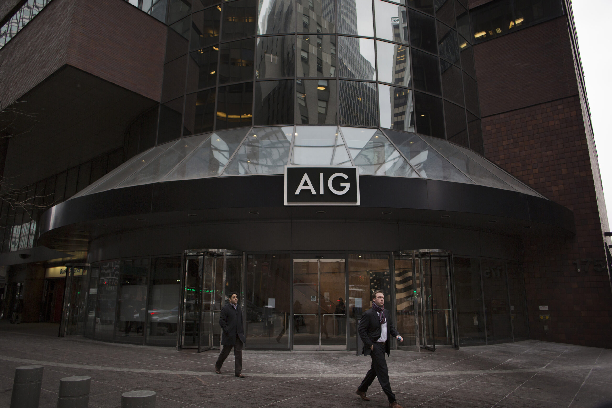 AIG loss doubles amid tax-overhaul costs, California wildfire payouts