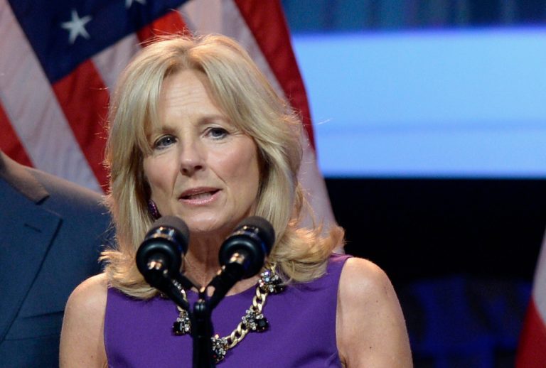 FILE - This April 7, 2014 file photo shows Jill Biden, wife of Vice President Joe Biden, speaking in Washington. Jill Biden is promoting a new website designed to make it easier for service members, veterans, their spouses and dependents to calculate their Post-9/11 GI Bill benefits at thousands of schools and job training programs. 