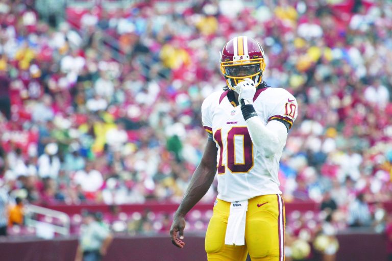 Jennifer Milbrett/The Washington Examiner
Rookie quarterback Robert Griffin III completed 11 of 17 passes for 74 yards and a touchdown as the Redskins won in his debut at FedEx Field on Saturday.