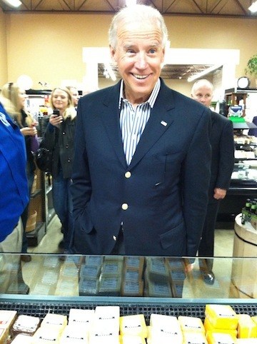 Biden hams it up at cheese shop