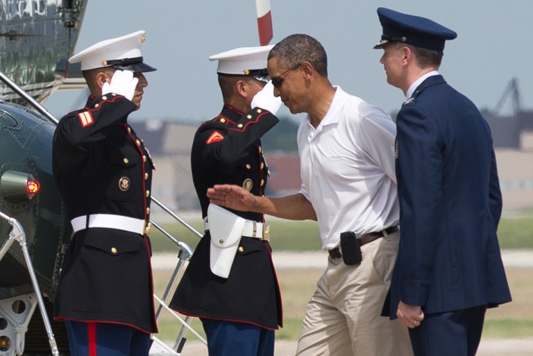   President Barack Obama, second from right, leaves Andrews Air Force Base, Md., for a weekend in Camp David, Md., Saturday, Aug. 3, 2013. The President turns 52 Sunday and will be spending his birthday at Camp David. (AP Photo/Manuel Balce Ceneta)  