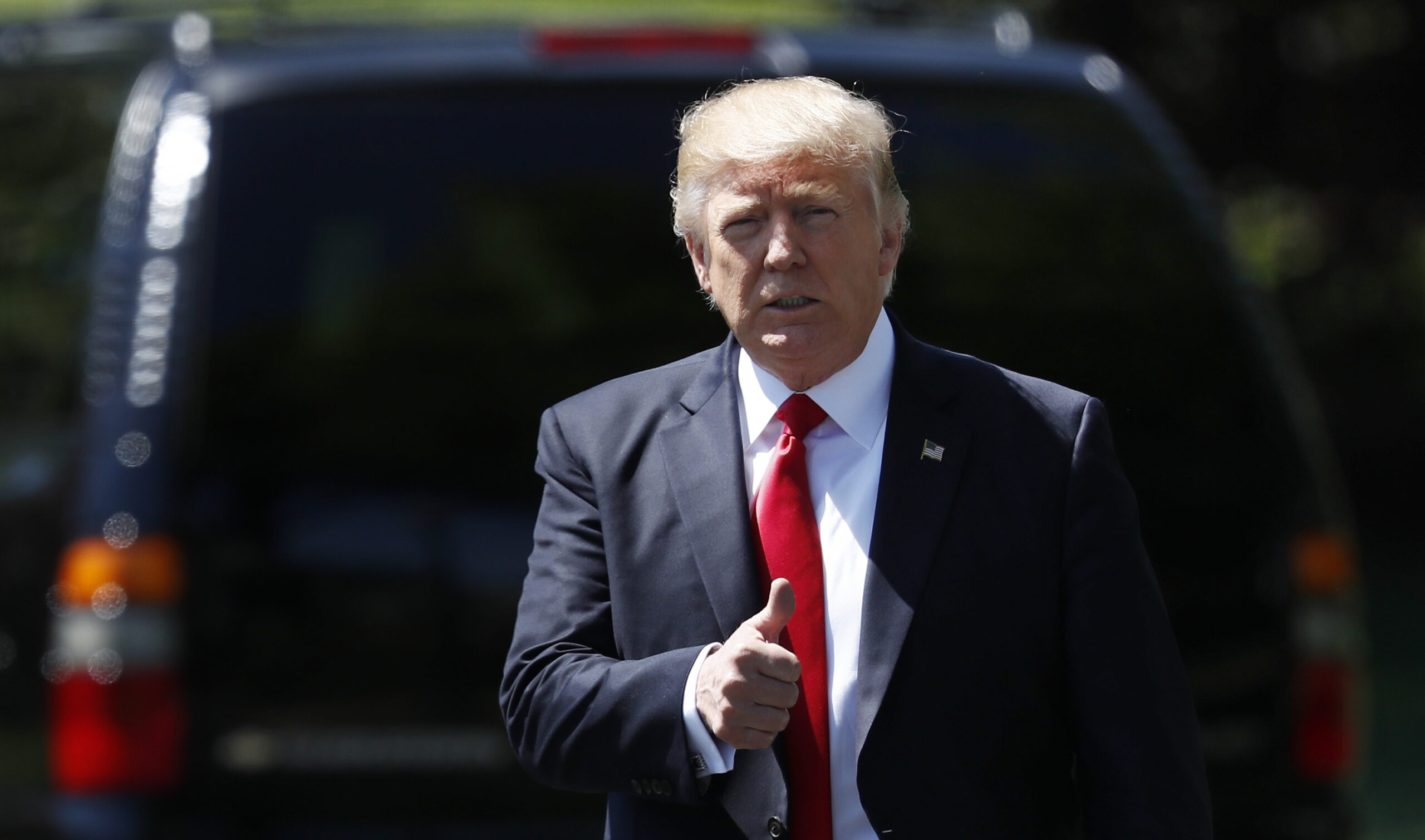 Americans split on Trump’s first 100 days, poll finds