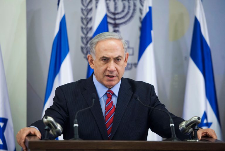 Israeli Prime Minister Benjamin Netanyahu speaks to the media in Tel Aviv, Israel, Sunday, June 15, 2014. Netanyahu has condemned Palestinian President Mahmoud Abbas' agreement with the militant group, and said he would hold him responsible for the safety of the youths, who disappeared apparently while hitchhiking in the West Bank late Thursday. (AP Photos/Dan Balilty)