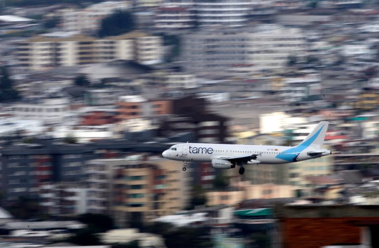 FILE - In this Jan. 22, 2013 file photo, an Ecuadorean Tame jetliner approaches the Mariscal Sucre airport, in Quito, Ecuador. The airline on Thursday, Jan. 23, 2014, suspended its daily flights to and from Venezuela until that country's cash-strapped government pays it $43 million owed for ticket sales. According to Venezuela's airlines association the Venezuelan government owes carriers several billion dollars due to its rigid currency controls. (AP Photo/Dolores Ochoa, File)