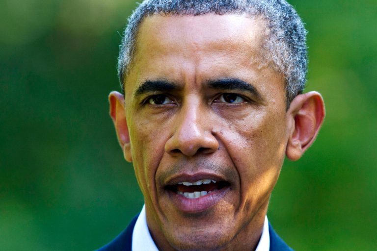 President Obama speaks about developments in Iraq, Monday, Aug. 11, 2014, from his vacation residence in Chilmark, Mass., during his family vacation on the island of Martha's Vineyard. (AP Photo/Jacquelyn Martin)