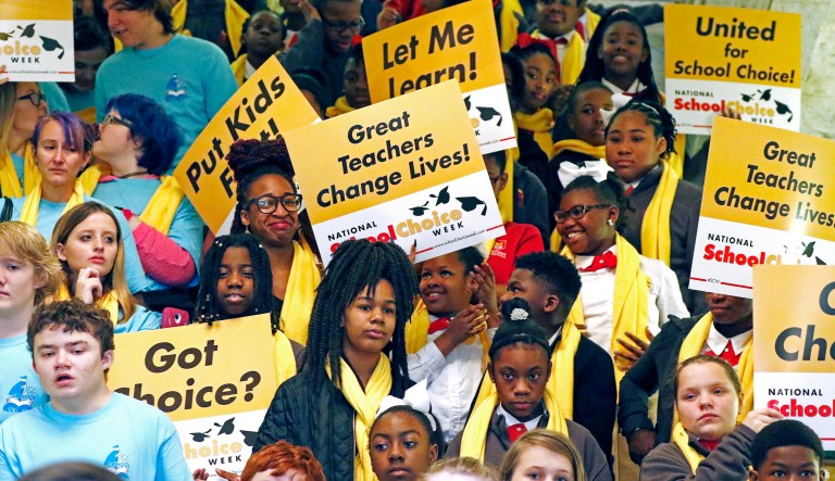 Test scores are not a definitive indicator of future success. College is. (AP Photo/Rogelio V. Solis)