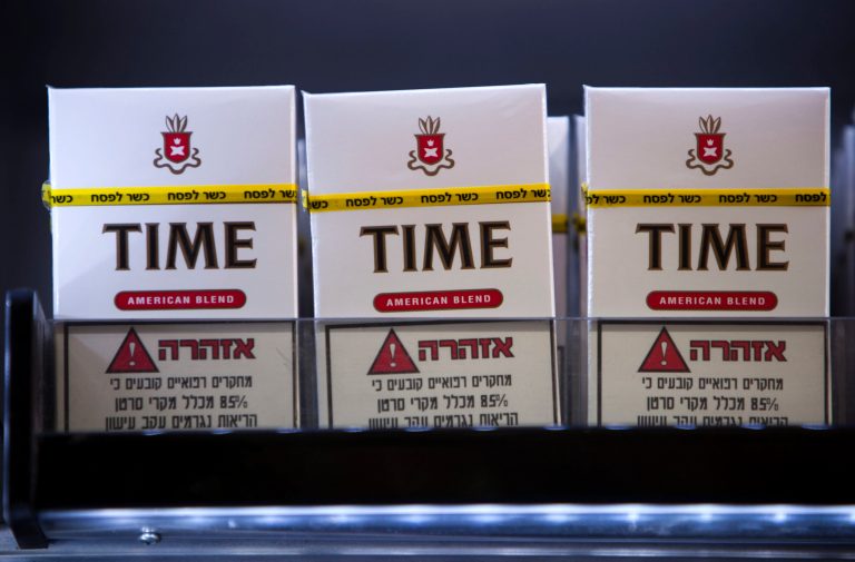 Cigarettes are for sale with a stamp of approval reading in Hebrew, 