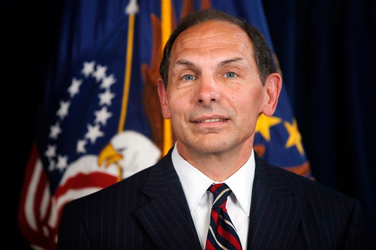 Former Procter and Gamble executive Robert McDonald, President Barack Obama's nominee as the next Veterans Affairs secretary, listens as Obama makes a statement at the Department of Veterans Affairs in Washington, Monday, June 30, 2014. If confirmed by the Senate, McDonald would succeed Eric Shinseki, the retired four-star general who resigned last month as the scope of the issues at veterans' hospitals became apparent. (AP Photo/Charles Dharapak)