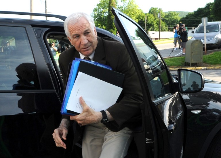   Former Penn State University assistant football coach Jerry Sandusky arrives for the fourth day of his trial at the Centre County Courthouse in Bellefonte, Pa., Thursday, June 14, 2012. Sandusky faces 52 counts of child sex-abuse involving 10 boys over a 15-year span. (AP Photo/Centre Daily Times, Nabil K. Mark)  