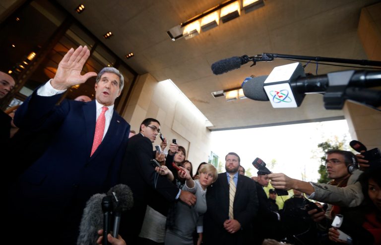 Secretary of State John Kerry speaks to the press upon his arrival in Geneva, Switzerland on Friday for multi-party talks on Iran's nuclear program. (AP/Jason Reed)