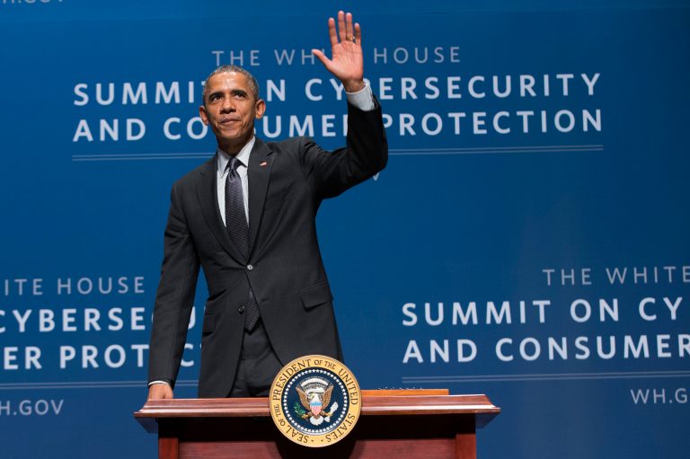 President Obama waves after signing an executive order promoting private sector cybersecurity information sharing during a summit on cybersecurity and consumer protection on Feb. 13 at Stanford University in Palo Alto, Calif. (AP Photo/Evan Vucci)