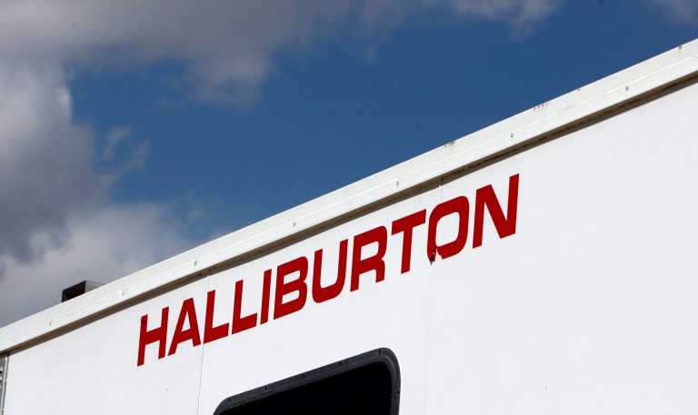 FILE - In this April 15, 2009, file photo, the Halliburton sign adorns the side of a machine being used by the company at a site for natural-gas producer Williams in Rulison, Colo. Halliburton reports quarterly earnings on Monday, April 21, 2014. (AP Photo/David Zalubowski, File)