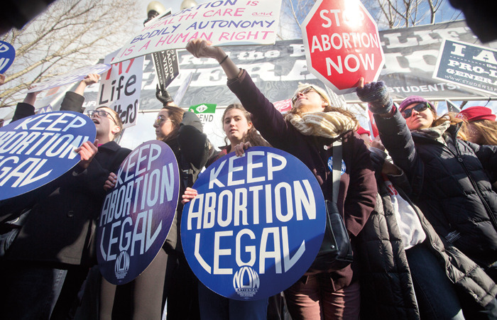 Pro-life and anti-abortion demonstrators converge in front of the Supreme Court in Washington, Thursday during the annual March for Life. (AP/Pablo Martinez Monsivais)