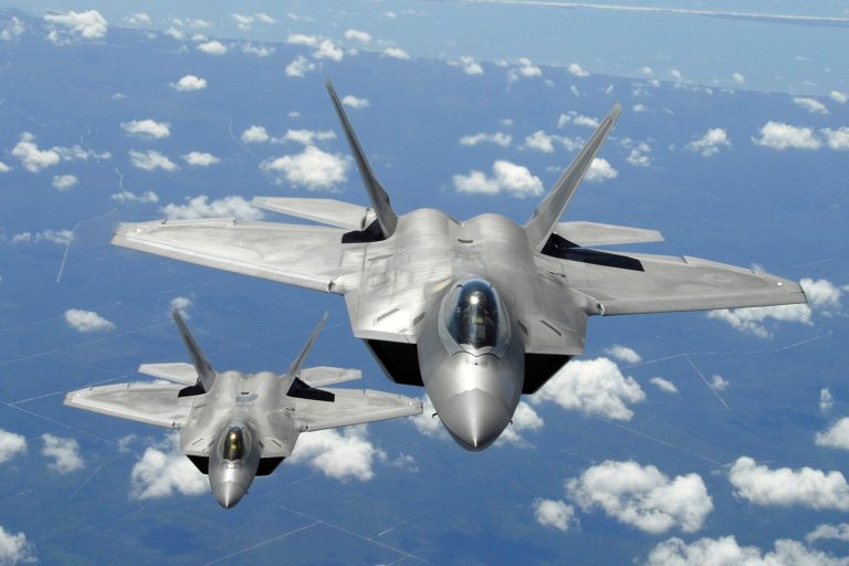 This Image provided by the US Air Force shows two U.S. Air Force F-22 Raptor aircraft flying in trail behind a KC-135R Stratotanker aircraft after inflight refueling during a training mission off the coast of Florida on April 2, 2007. (AP Photo/US Air Force/Thomas Meneguin)