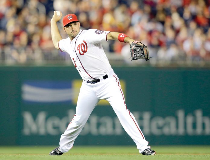 Alex Brandon/AP
Ryan Zimmerman, who has had trouble throwing the ball this season, went on the disabled list Saturday with a sore left hamstring.