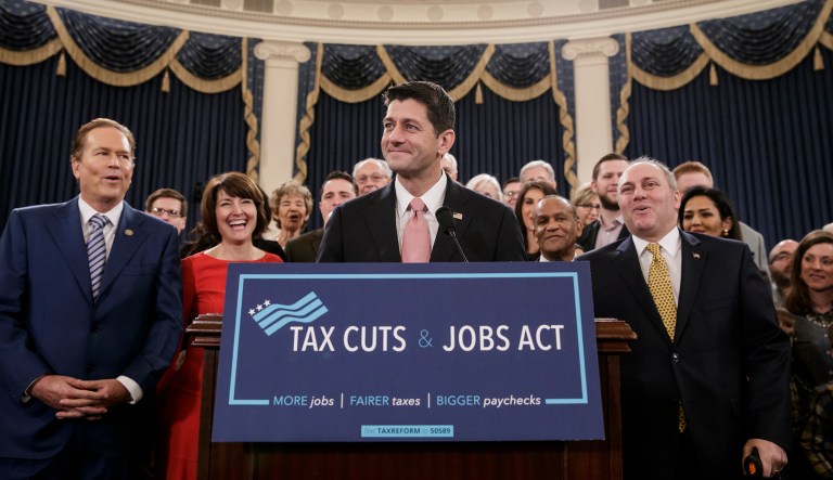 Speaker of the House Paul Ryan, R-Wis., smiles as he is joined by, from left, Rep. Vern Buchanan, R-Fla., Rep. Cathy McMorris Rodgers, R-Wash., and House Majority Whip Steve Scalise, R-La., right, as they unveil the GOP's far-reaching tax overhaul, the first major revamp of the tax system in three decades, on Capitol Hill in Washington, Thursday, Nov. 2, 2017. (AP Photo/J. Scott Applewhite)