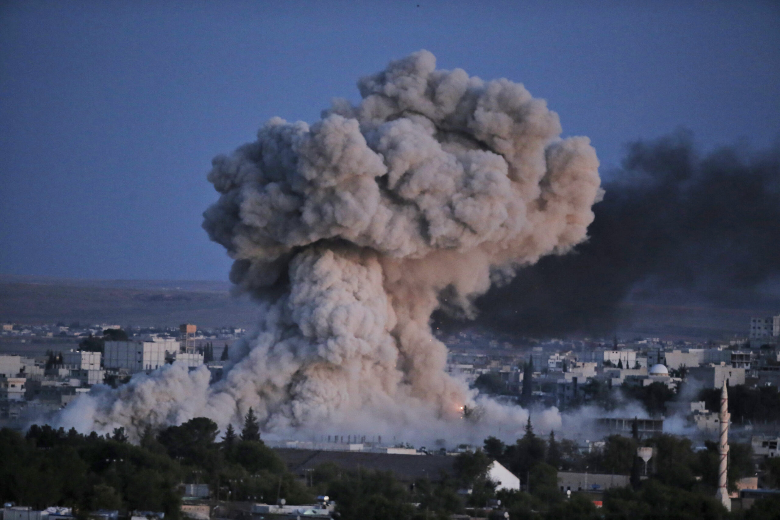Turkey says it helps Kurdish fighters enter Syria
