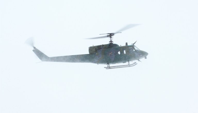 A UH-1N Huey, like the one shown above, made a 