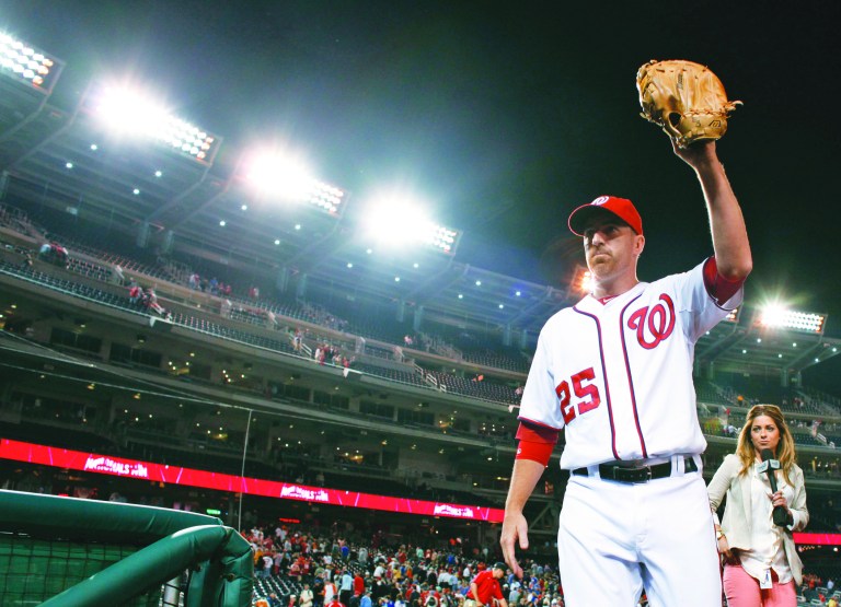 Alex Brandon/AP
Nationals first baseman Adam LaRoche has 23 home runs and 72 RBIs this season, but he's equally valuable as a defender.