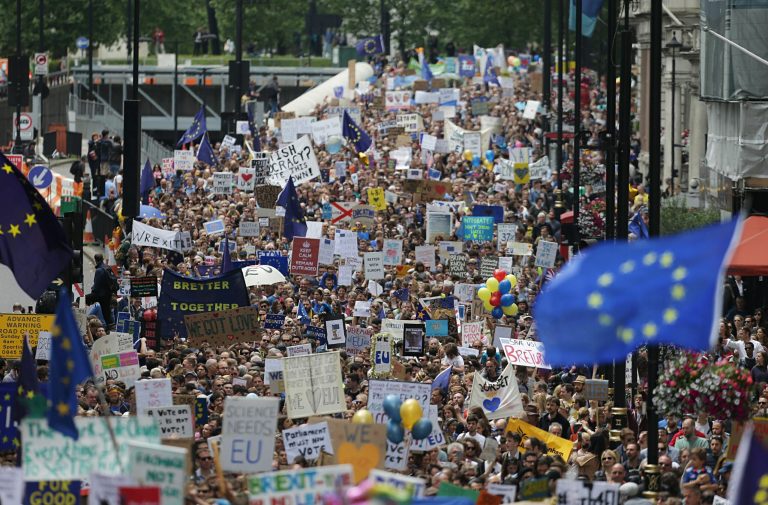 The protesters said the British Parliament should overrule Britons' 52-48 percent vote in favor of leaving. (Daniel Leal-Olivas/PA via AP)
