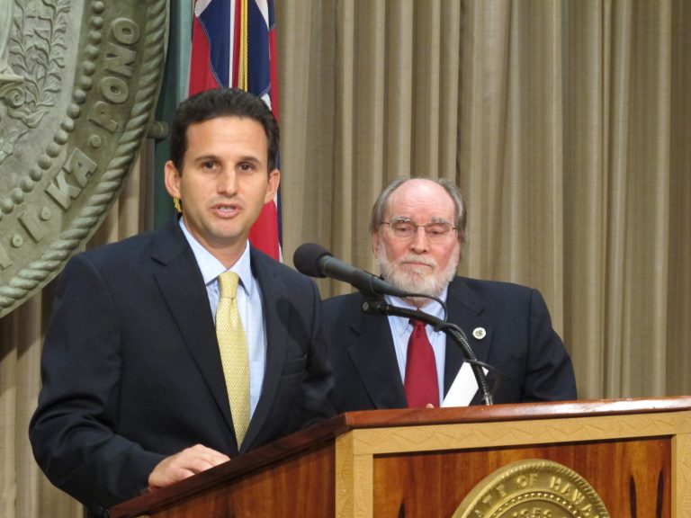   Hawaii Lt. Gov. Brian Schatz speaks the state Capitol in Honolulu on Wednesday, Dec. 26. 2012 after Gov. Neil Abercrombie, right, announced he was appointing Schatz to fill the seat vacated by the late U.S. Sen. Daniel Inouye. (AP Photo/Audrey McAvoy)  