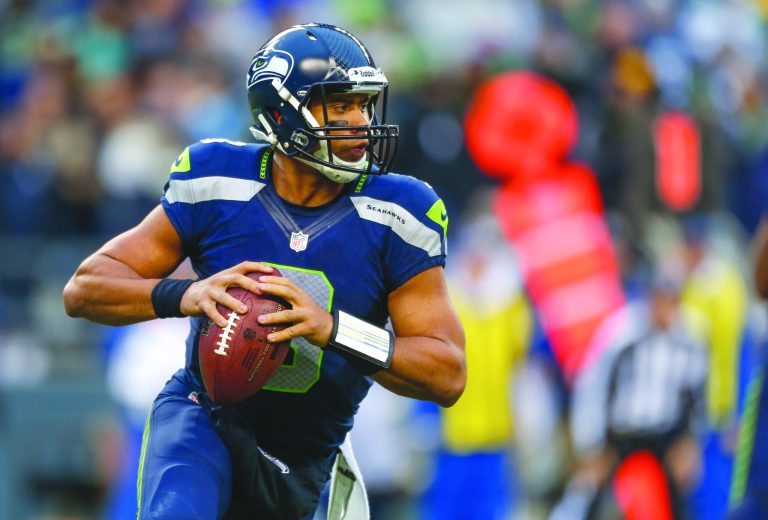 Otto Greule Jr/Getty Images
Russell Wilson completed 252 of 393 passes for 3,118 yards and 26 touchdowns, finishing with a 100.0 passer rating.