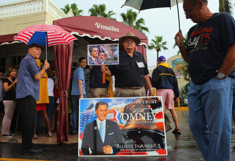 MIAMI, FL - SEPTEMBER 22:  Supporters of  Republican vice presidential candidate, U.S. Rep. Paul Ryan (R-WI) and Presidential candidate Mitt Romney are seen outside during a Ryan campaign stop at Versailles restaurant in the Little Havana neighborhood on September 22, 2012 in Miami, Florida. Ryan continues to campaign for votes across the country.  (Photo by Joe Raedle/Getty Images)