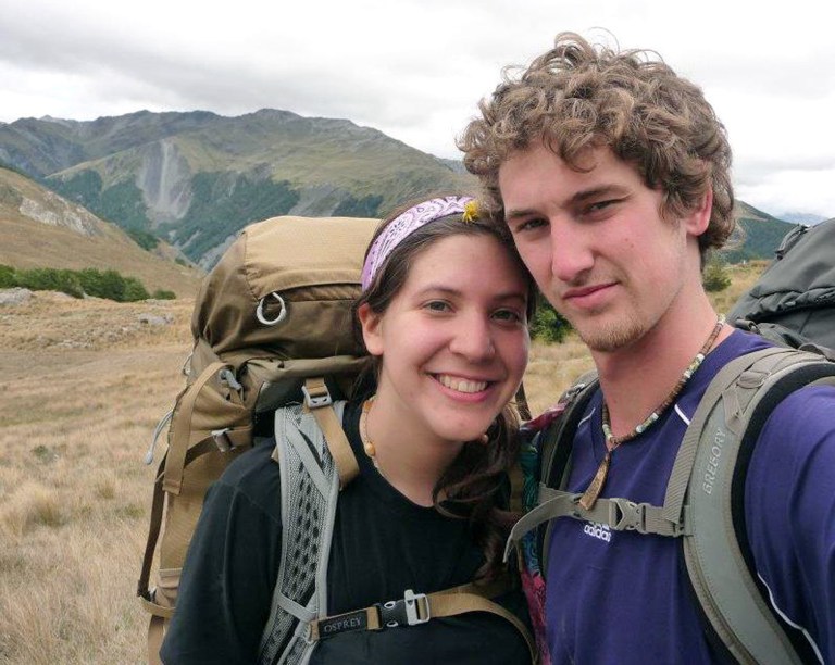   ADDS YEAR AND LOCATION PHOTO WAS TAKEN IN - In this 2012 photo provided by Alec Brown, Alec, right, and his girlfriend Erica Klintworth pose near mountains in Arthur's Pass, New Zealand. The two 21-year-old American students walked out of the New Zealand wilderness Sunday, June 10, 2012, after a snowstorm trapped them for nine days. (AP Photo/Alec Brown) EDITORIAL USE ONLY  