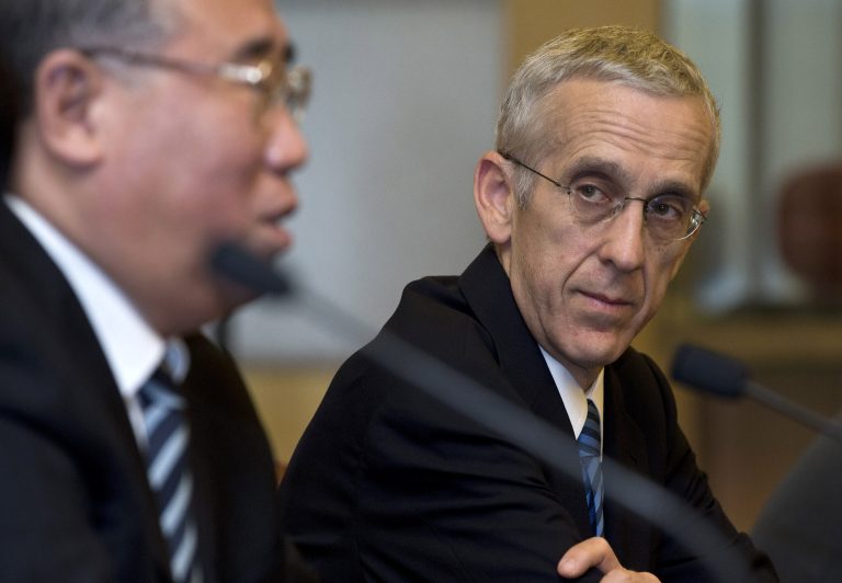 U.S. climate change envoy Todd Stern, right, looks at his Chinese counterpart Xie Zhenhua speak during a press briefing of a joint statement on a climate change meeting at the Diaoyutai State Guesthouse in Beijing Friday, May 31, 2013. (AP Photo/Andy Wong)