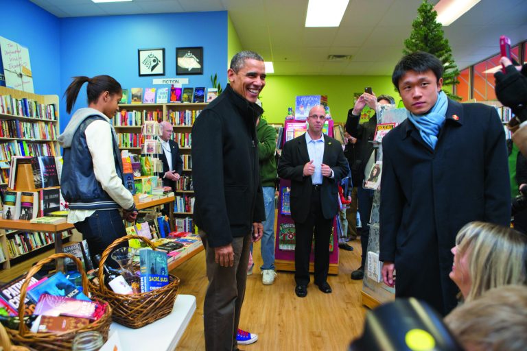 President Barack Obama, with daughter Malia, left, goes shopping at a small bookstore, One More Page, in Arlington, Va., Saturday, Nov. 24, 2012. (AP Photo/J. Scott Applewhite)