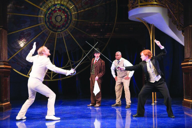 Courtesy of Scott Suchman
Sir Andrew Aguecheek (James Konicek), left, duels the disguised Viola (Emily Trask), as Feste (Louis Butelli) and Sir Toby Bech (Craig Wallace) look on in 