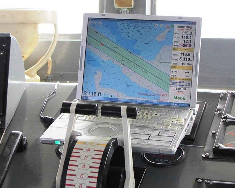This undated photo made available by NOAA shows a computer displaying an electronic nautical chart aboard a ship. The National Oceanic and Atmospheric Administration announced Tuesday, Oct. 22, 2013 that the traditional heavy paper lithographic nautical charts will stop being printed next April. Capt. Shep Smith, head of NOAAÃ?s chart division, said the agency will still chart the water for rocks, shipwrecks and dangers, but mariners will have to see the information using private on-demand printing, PDFs and electronic maps. (AP Photo/NOAA)