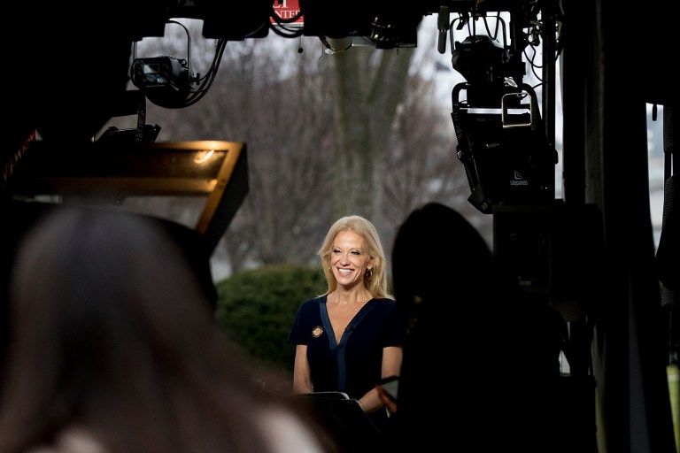 President Donald Trump's adviser Kellyanne Conway gets ready to speak on television outside the White House, Sunday, Jan. 22, 2017, in Washington. (AP Photo/Andrew Harnik)