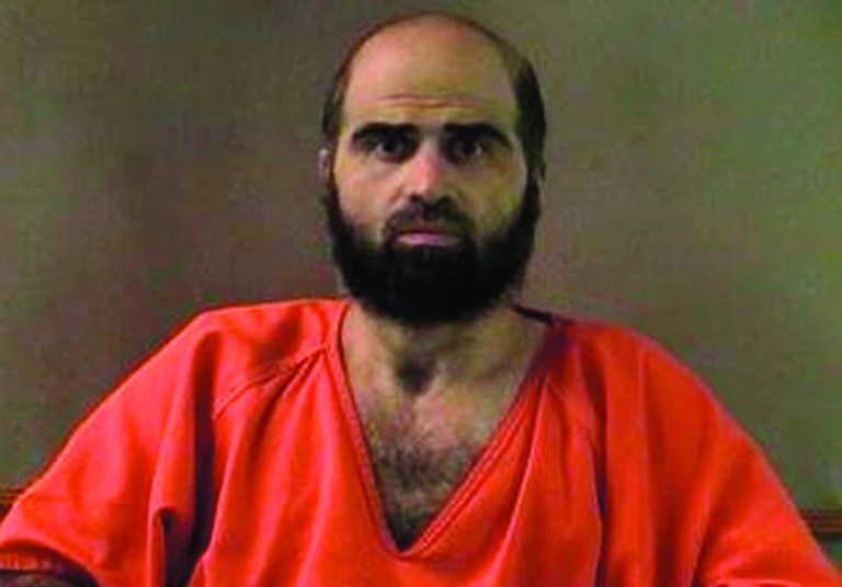 FILE - This undated file photo provided by the Bell County Sheriff's Department via The Temple Daily Telegram shows Nidal Hasan, the Army psychiatrist charged in the deadly 2009 Fort Hood shooting. Hasan should be forced to shave his beard to avoid any potential jury bias in his pending murder trial, say some military experts and the judge overseeing his pending court-martial. (AP Photo/Bell County Sheriff's Department via The Temple Daily Telegram, File)
