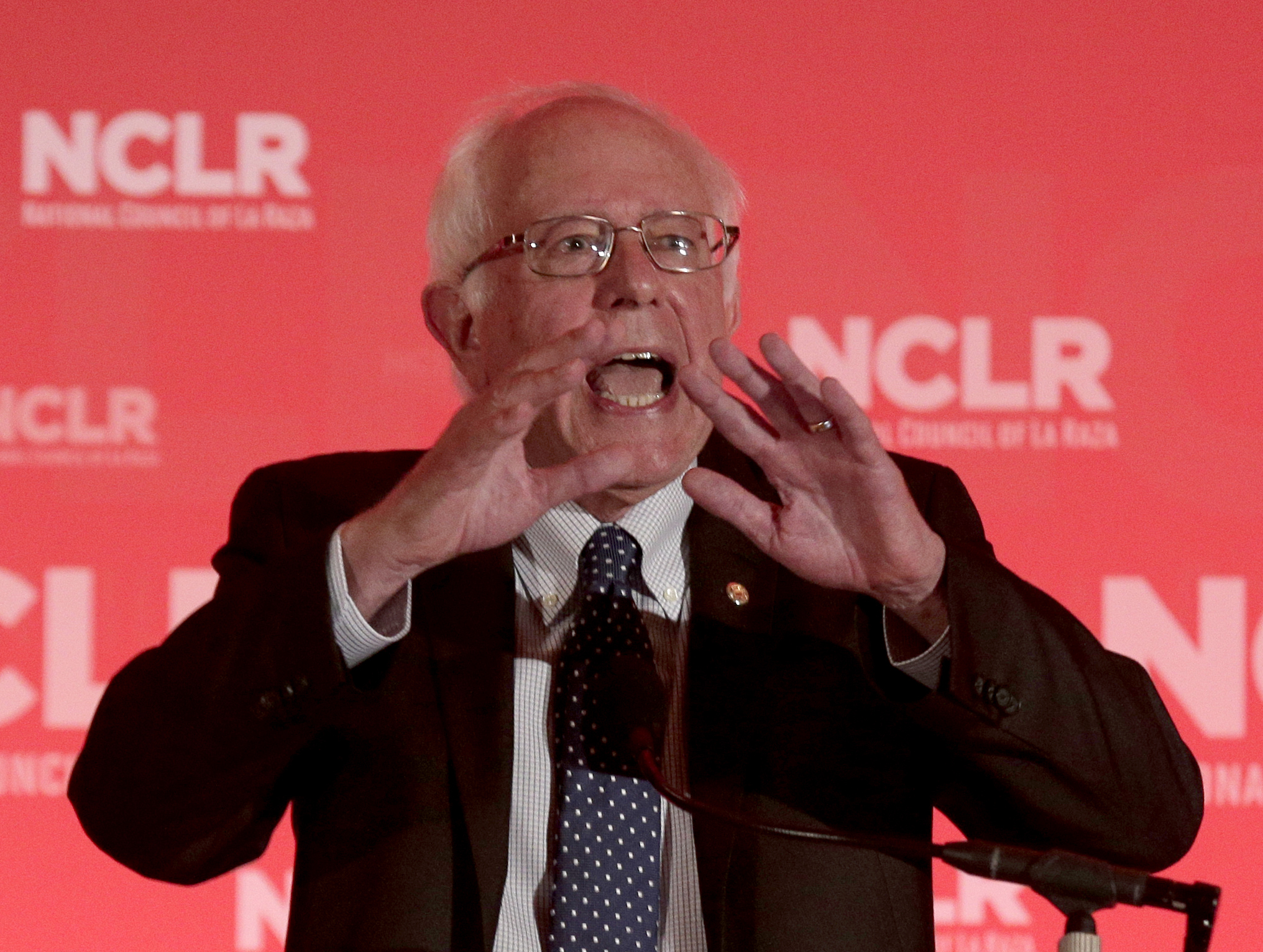 Sanders takes on Clinton while she meets with Democrats