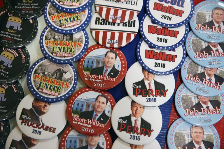 A vendor sell campaign buttons at the Point of Grace Church before the start of the Iowa Faith and Freedom Coalition 2015 Spring Kickoff on April 25, 2015 in Waukee, Iowa. (Photo by Scott Olson/Getty Images)