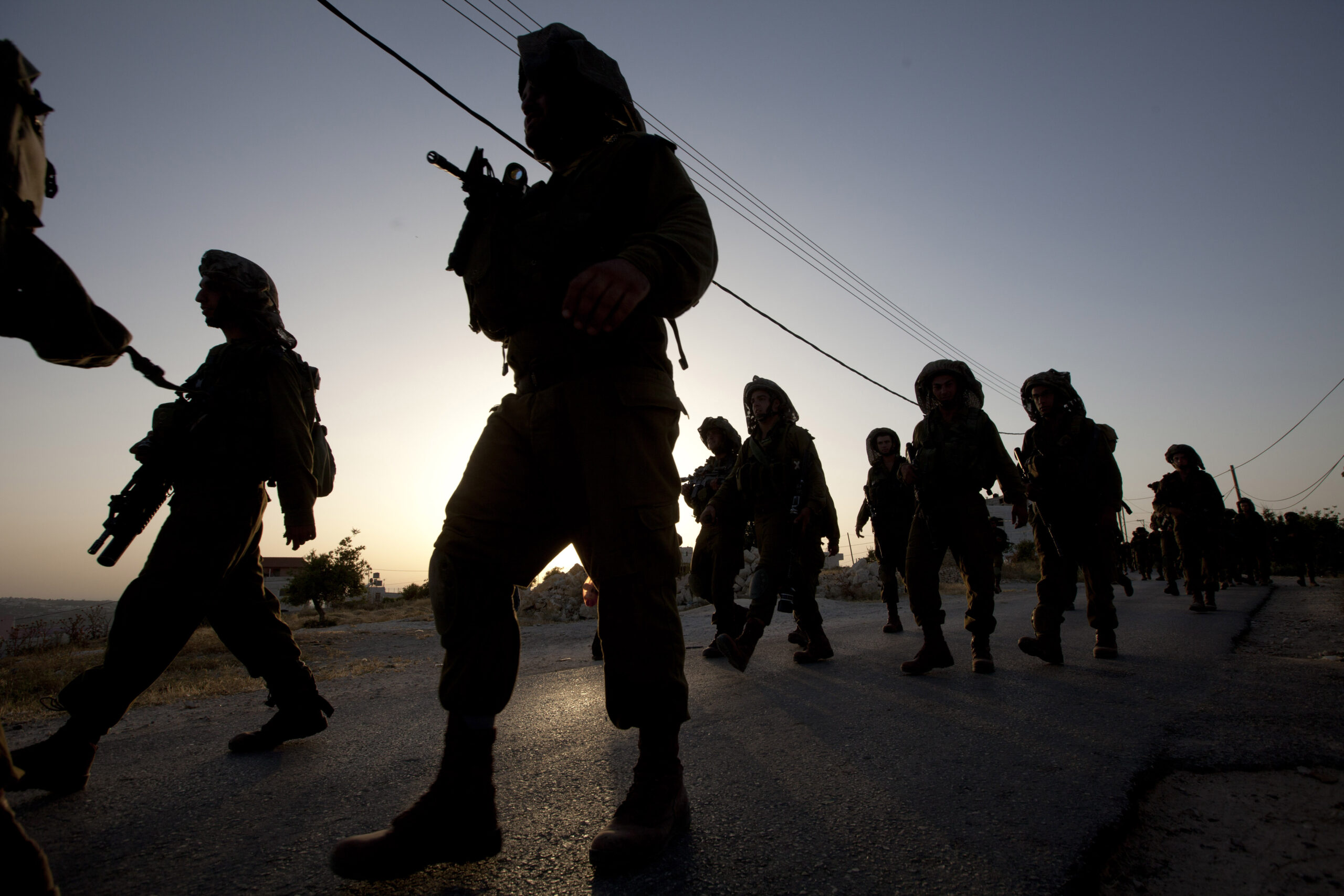 Israel cracks down on Hamas amid search for teens