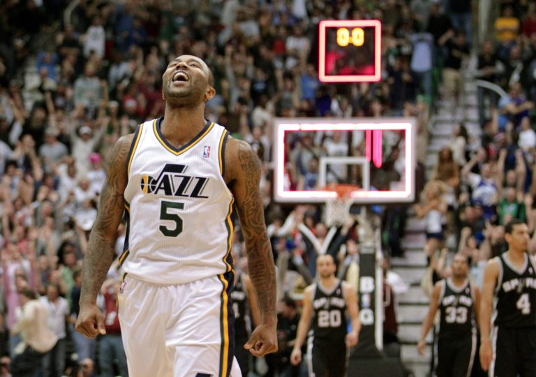   Utah Jazz point guard Mo Williams (5) celebrates after scoring the game-winning shot an the end of their NBA basketball game against the San Antonio Spurs Wednesday, Dec. 12, 2012, in Salt Lake City. The Jazz defeated the Spurs 99-96. (AP Photo/Rick Bowmer)  