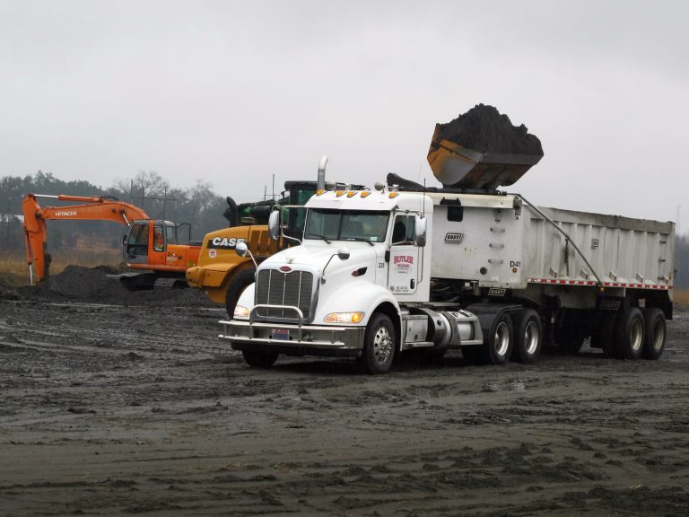 Coal ash is loaded into a truck at at Santee Cooper's Jefferies power generating station just outside Moncks Corner, S.C., on Feb. 26, 2014. The recycled coal ash is trucked from the site and then used in the manufacture of concrete. Santee Cooper is South Carolina's state-owned electric and water utility. (AP Photo/Bruce Smith)