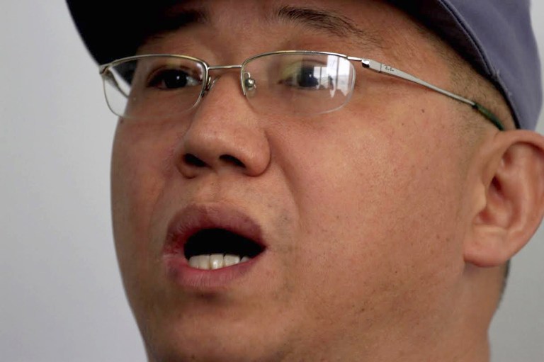 American missionary Kenneth Bae speaks to reporters at Pyongyang Friendship Hospital in Pyongyang. (AP/Kim Kwang Hyon)